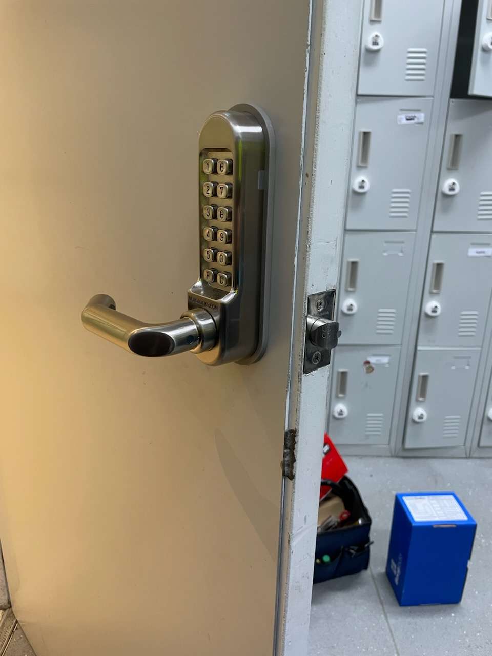 Digital keypad lock fitted to a commercial door